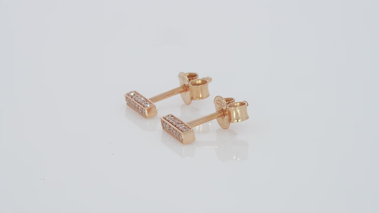 Small bar earrings featuring certified diamonds in solid 18ct gold, perfect for stacking and versatile in style.