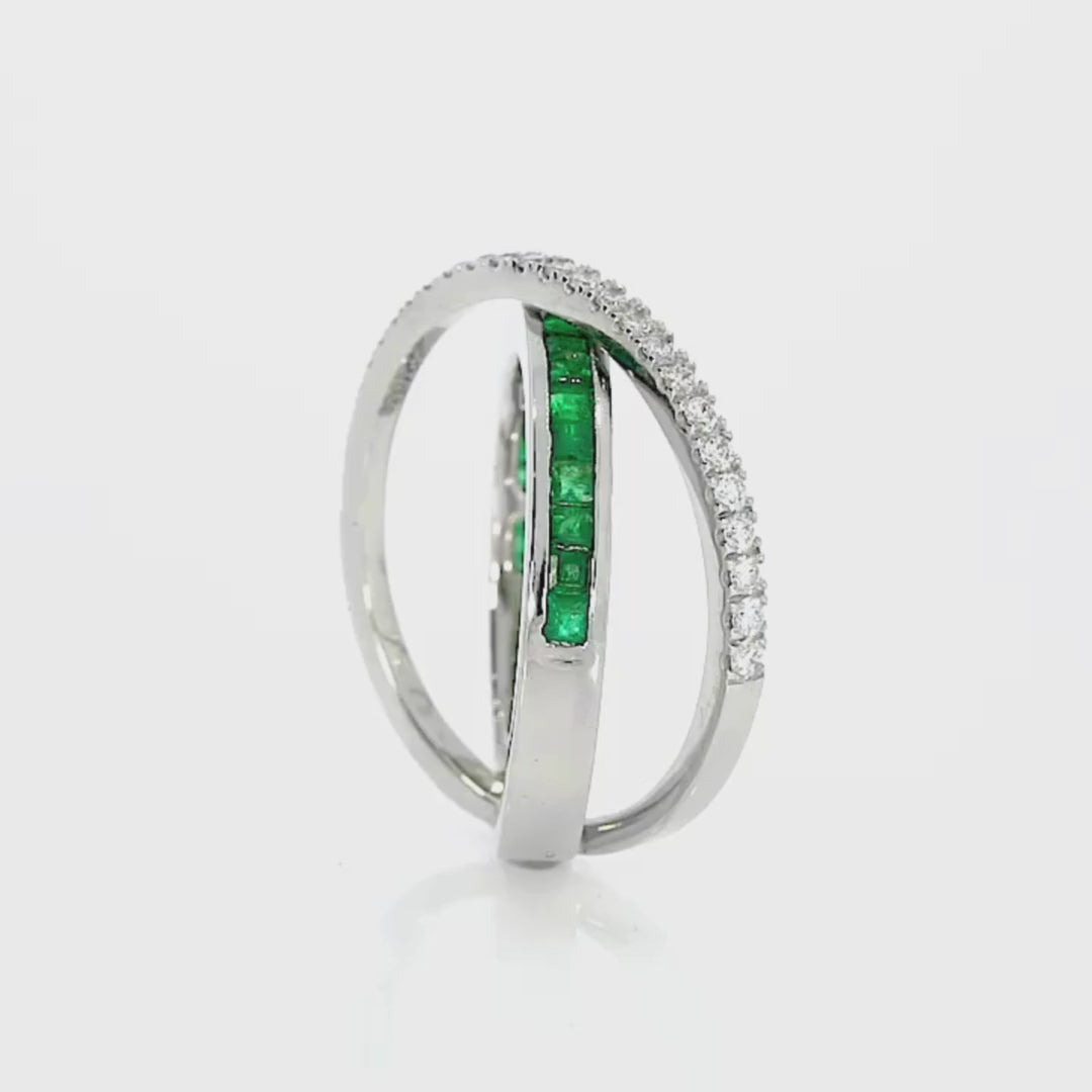 Emerald Criss Cross Ring showcasing green emeralds and diamonds in 18ct white gold or platinum gemstone ring design