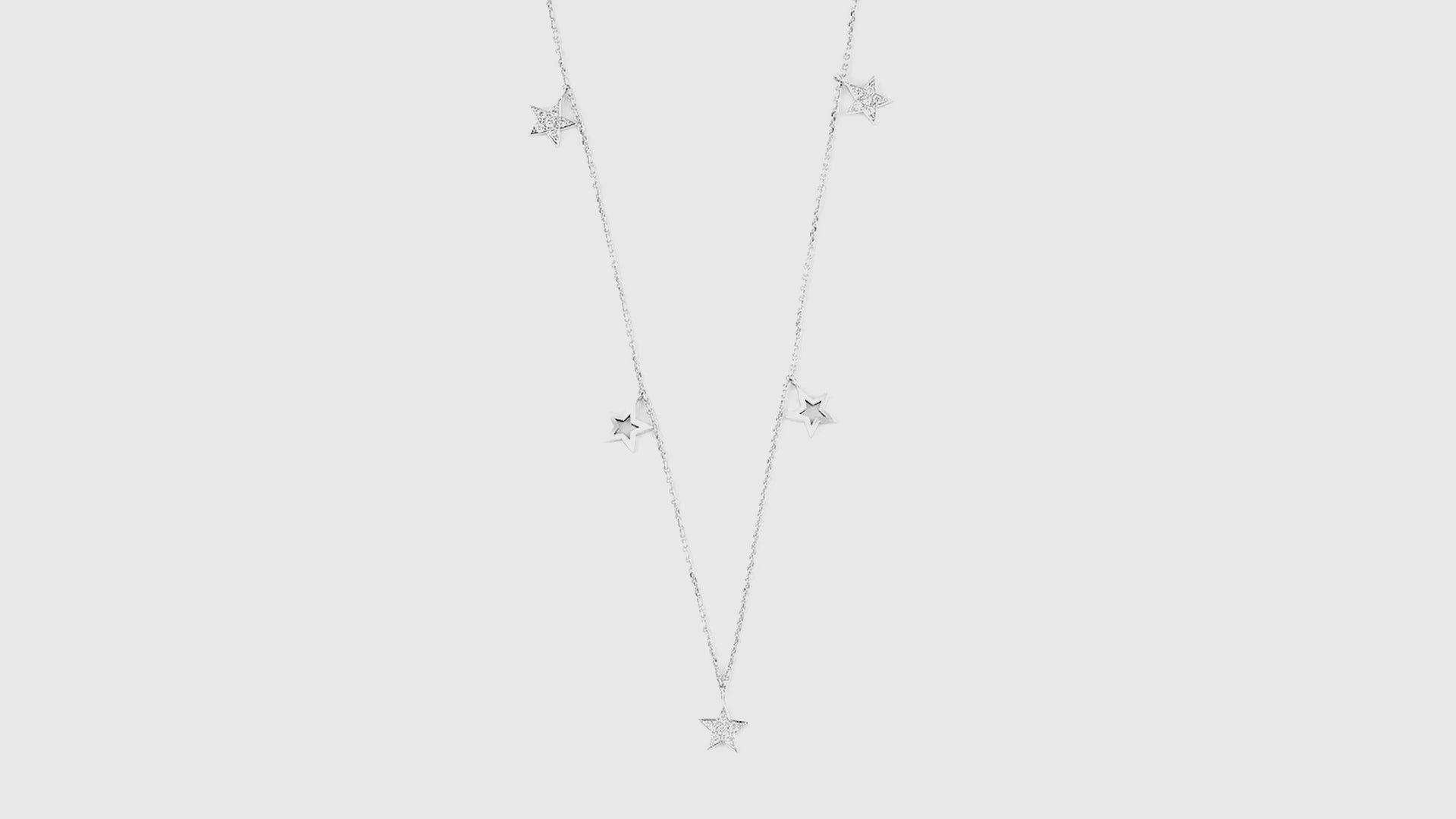 Elegantly designed certified diamond necklace featuring solid gold and diamond set stars, on a fine gold chain.