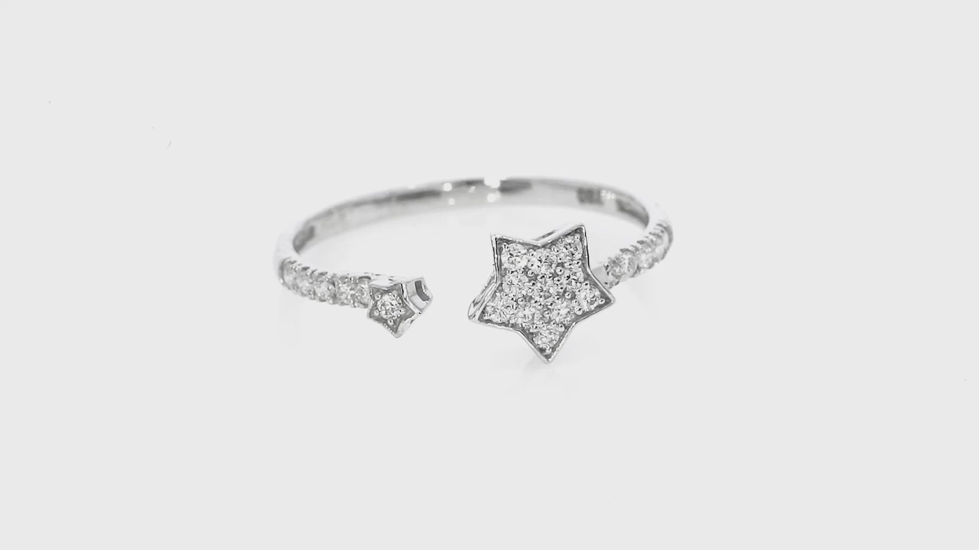 Diamond Star Ring in a delicate 18ct gold cluster with 0.20cts with round brilliant cut diamonds in Gemini style.