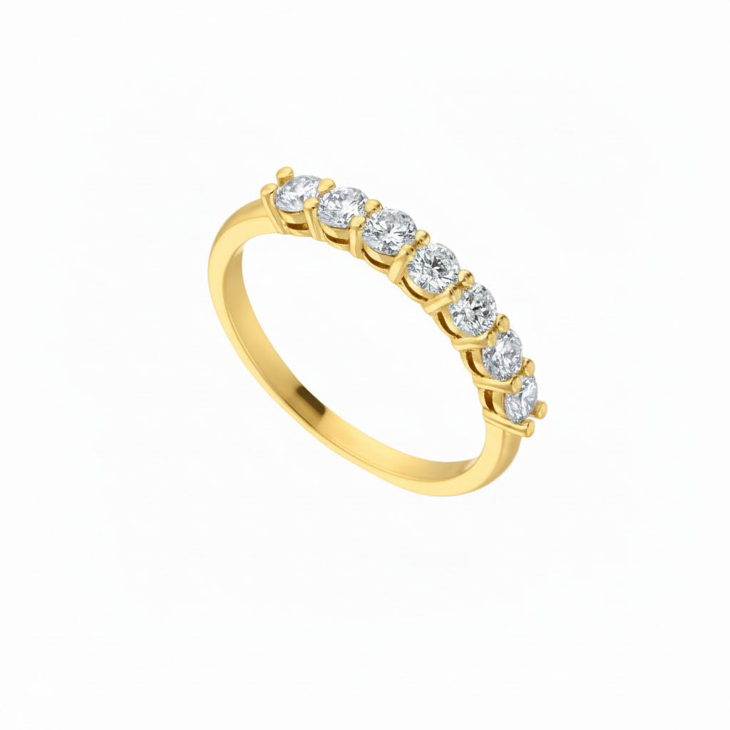 Seven stone round brilliant diamond eternity ring in yellow gold, featuring 0.70cts of certified diamonds.