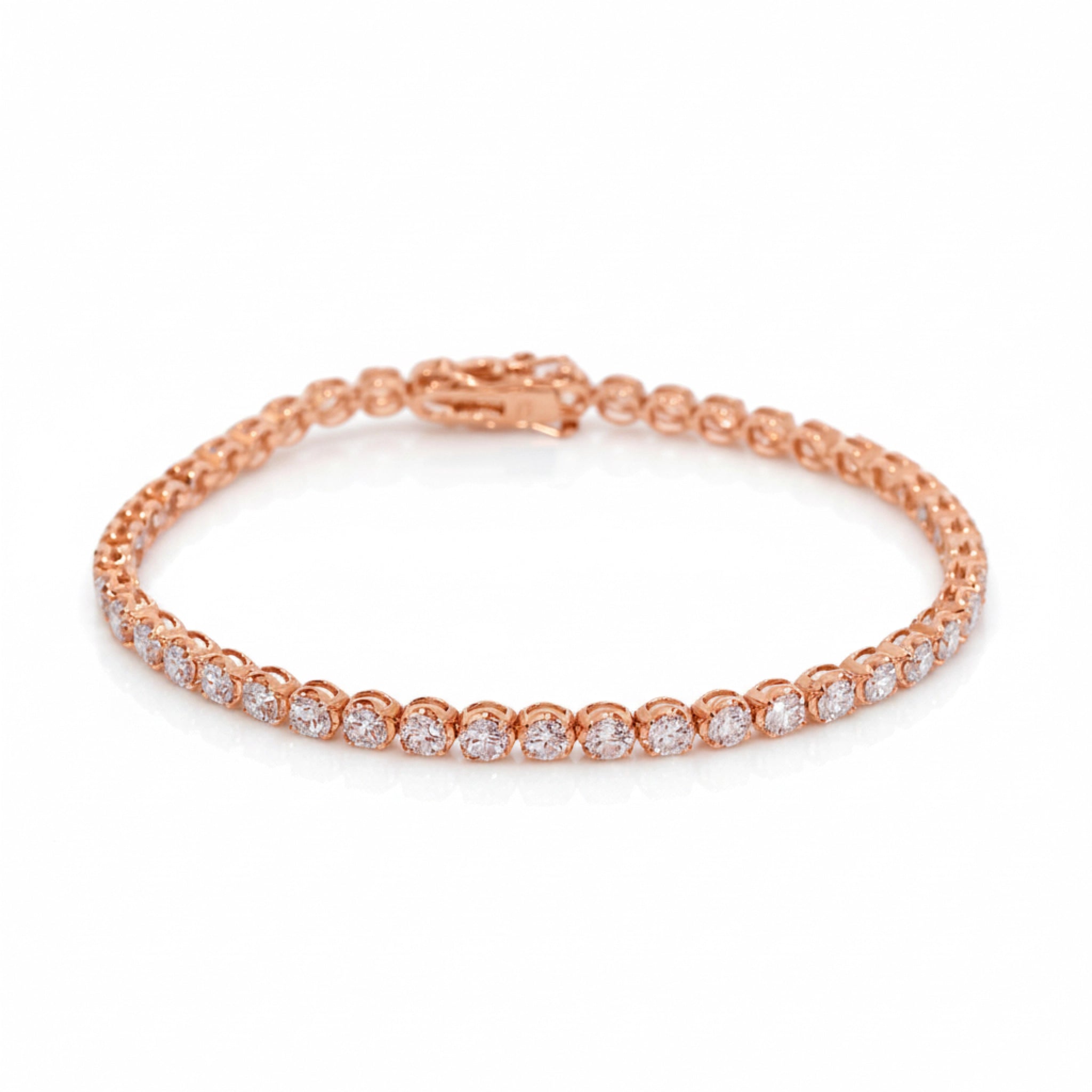 Elegant diamond tennis bracelet featuring round brilliant cut diamonds set in 18ct rose gold.