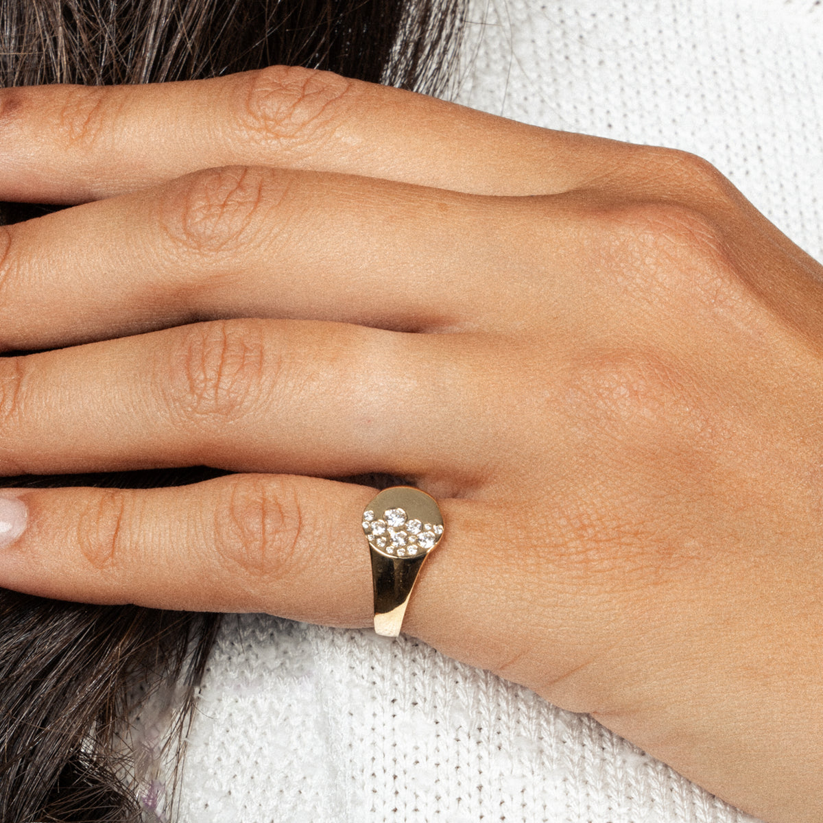 Elegant diamond ring on a hand, showcasing a unique sprinkle design and delicate beauty for everyday wear.
