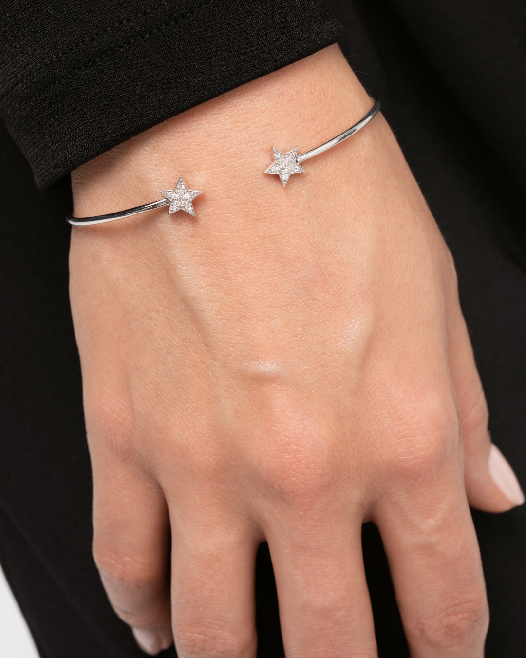 Star bangle featuring certified diamond stars, perfect for stacking or everyday wear.