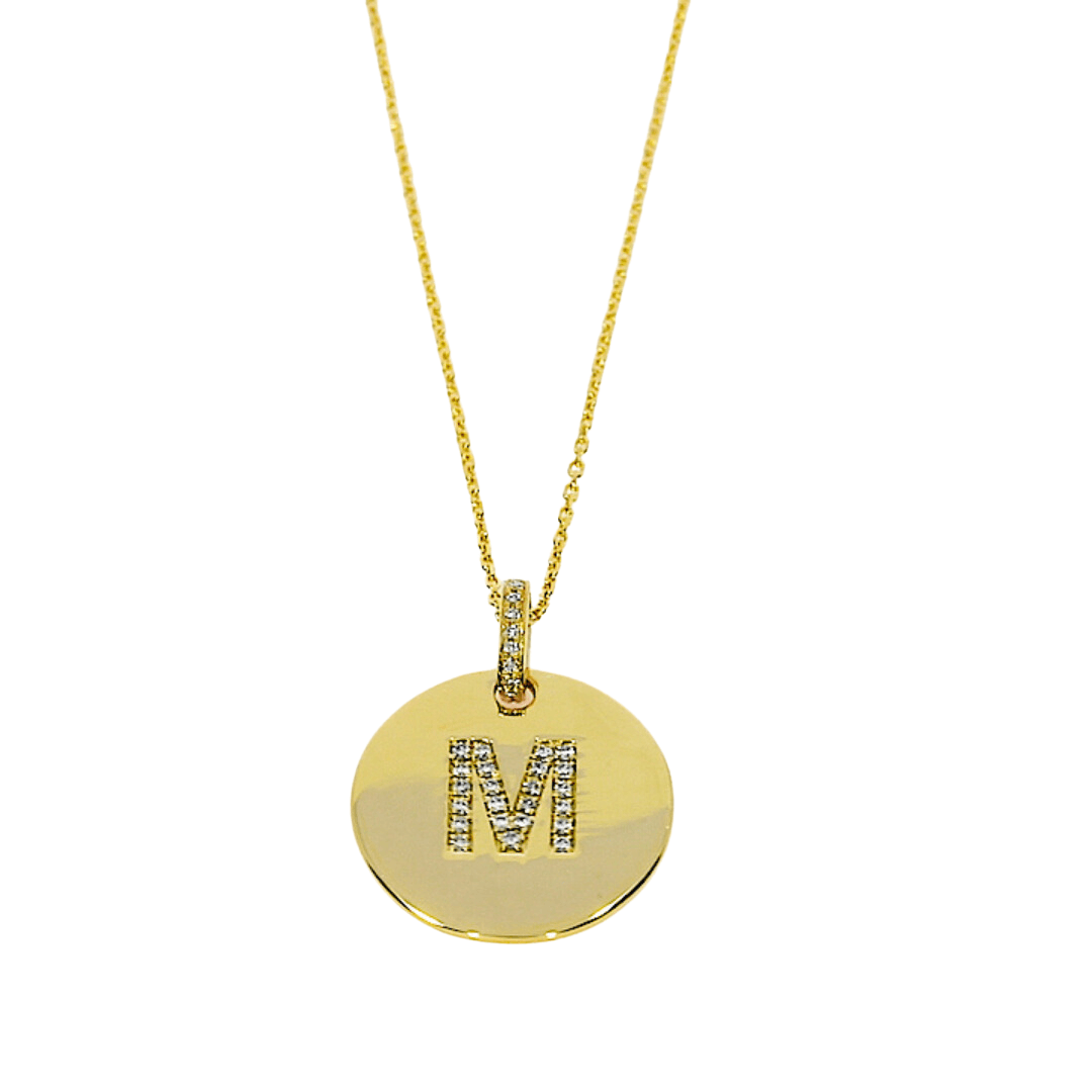 Love Letter Disk necklace with initial M in certified diamonds set in 18ct gold chain.