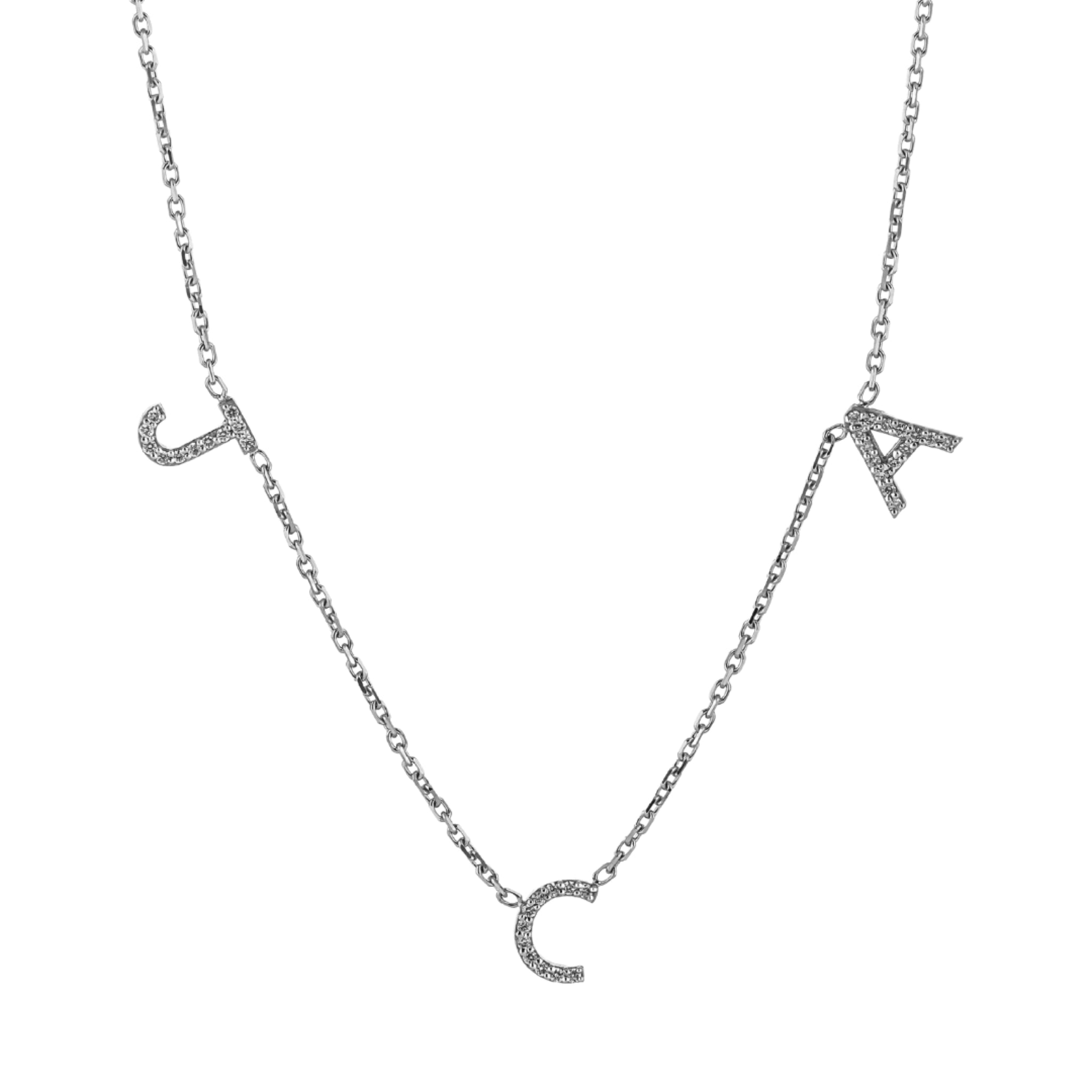 Love Letter necklace with natural diamond initials on a fine link chain featuring sparkling details.