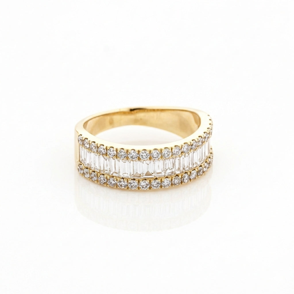 Yellow gold diamond eternity ring with baguette cut diamonds on a white background