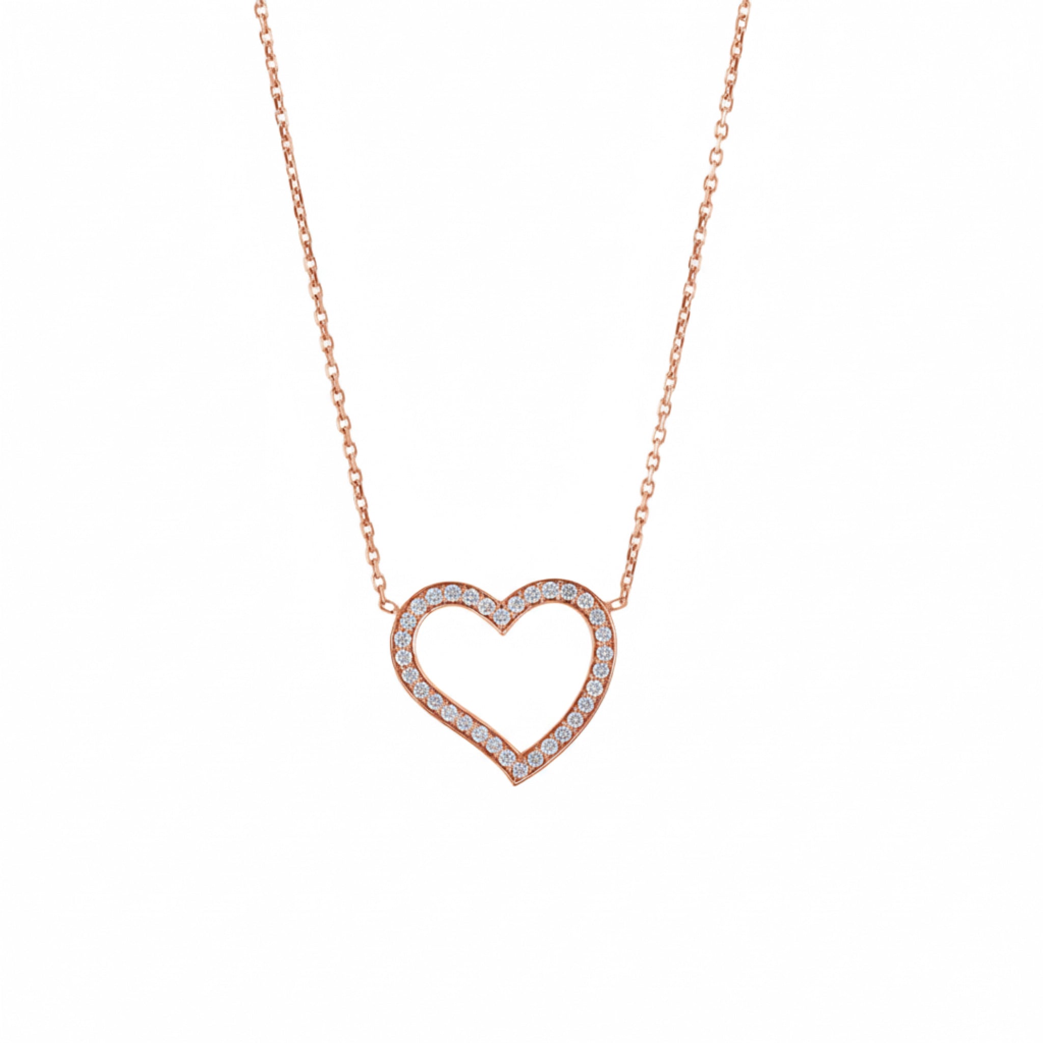 Amélie heart pendant necklace in 18ct rose gold with round brilliant diamonds, symbolising modern romance.