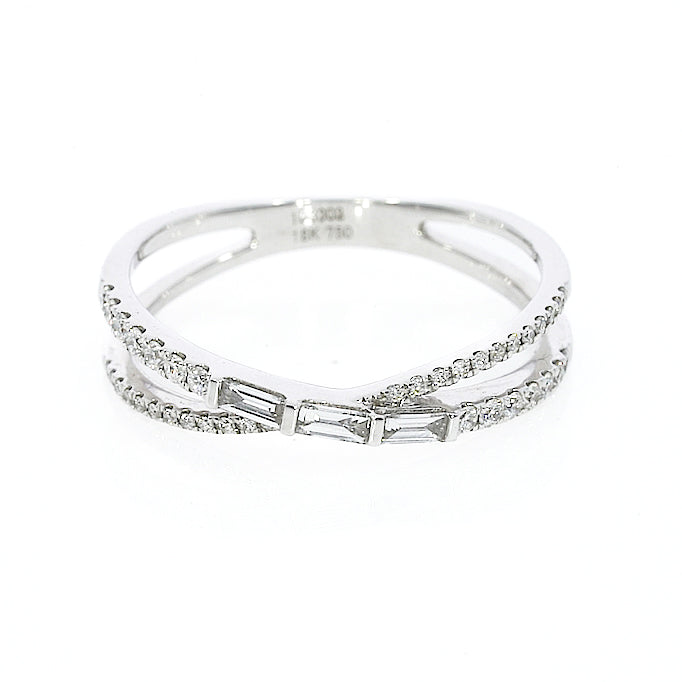 Modern criss-cross ring with 0.28cts of baguette and round cut  luxury fine diamonds in white gold colour set in 18ct gold.  