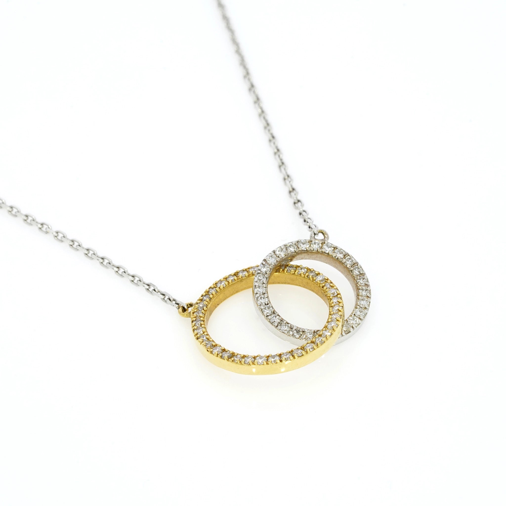 circle diamond necklace featuring certified diamonds in 18ct gold interlocking design.