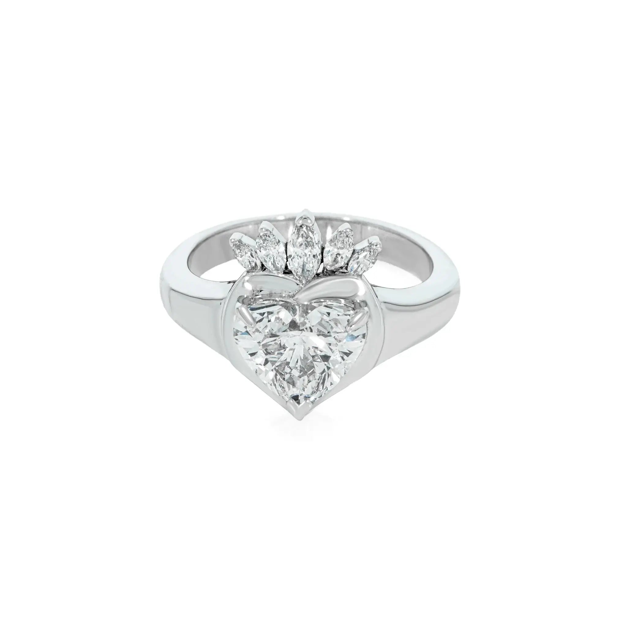 Claddagh ring featuring a heart-shaped diamond and sculptural crown, symbolizing love and strength.