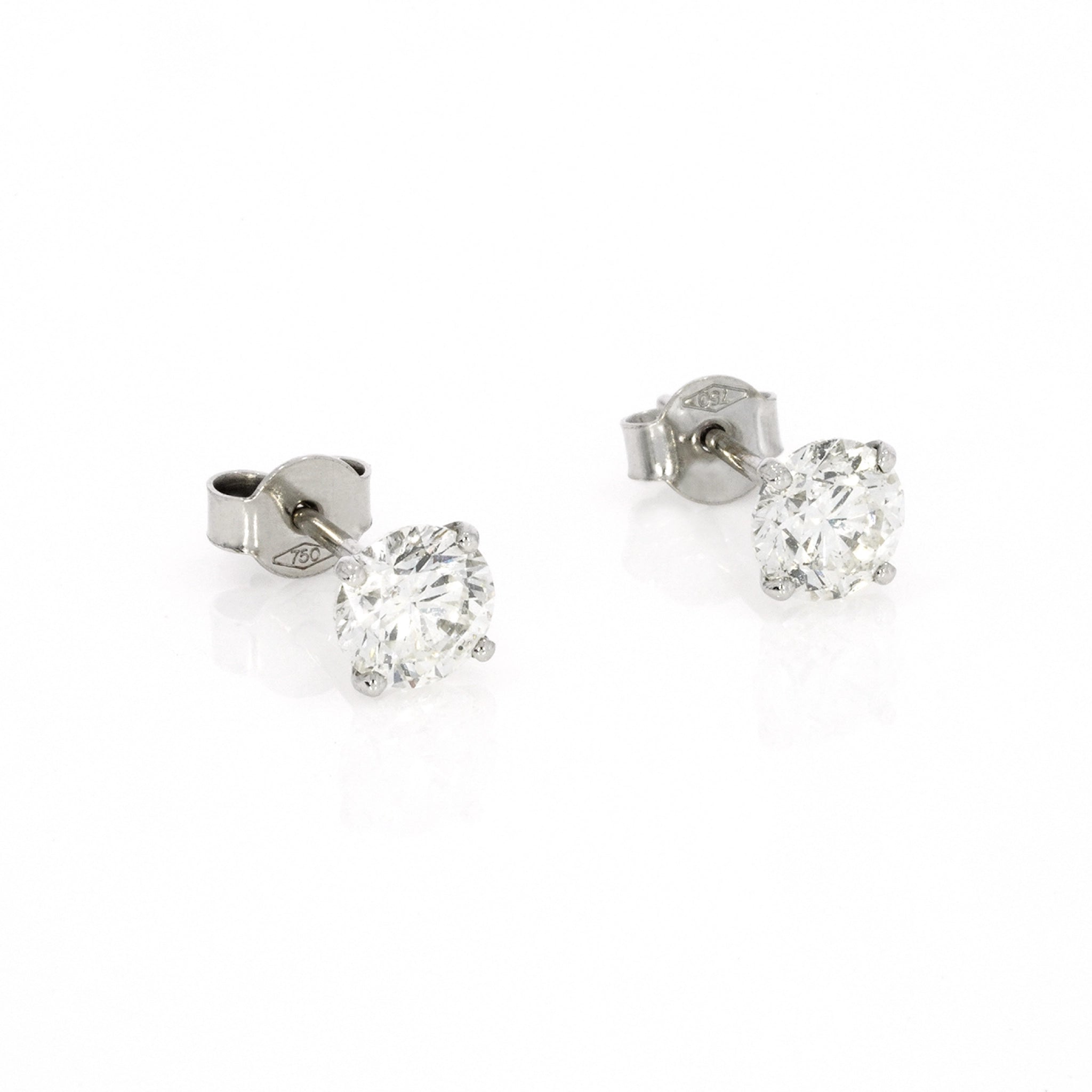 Handmade certified diamond earrings in fine open basket setting for maximum sparkle