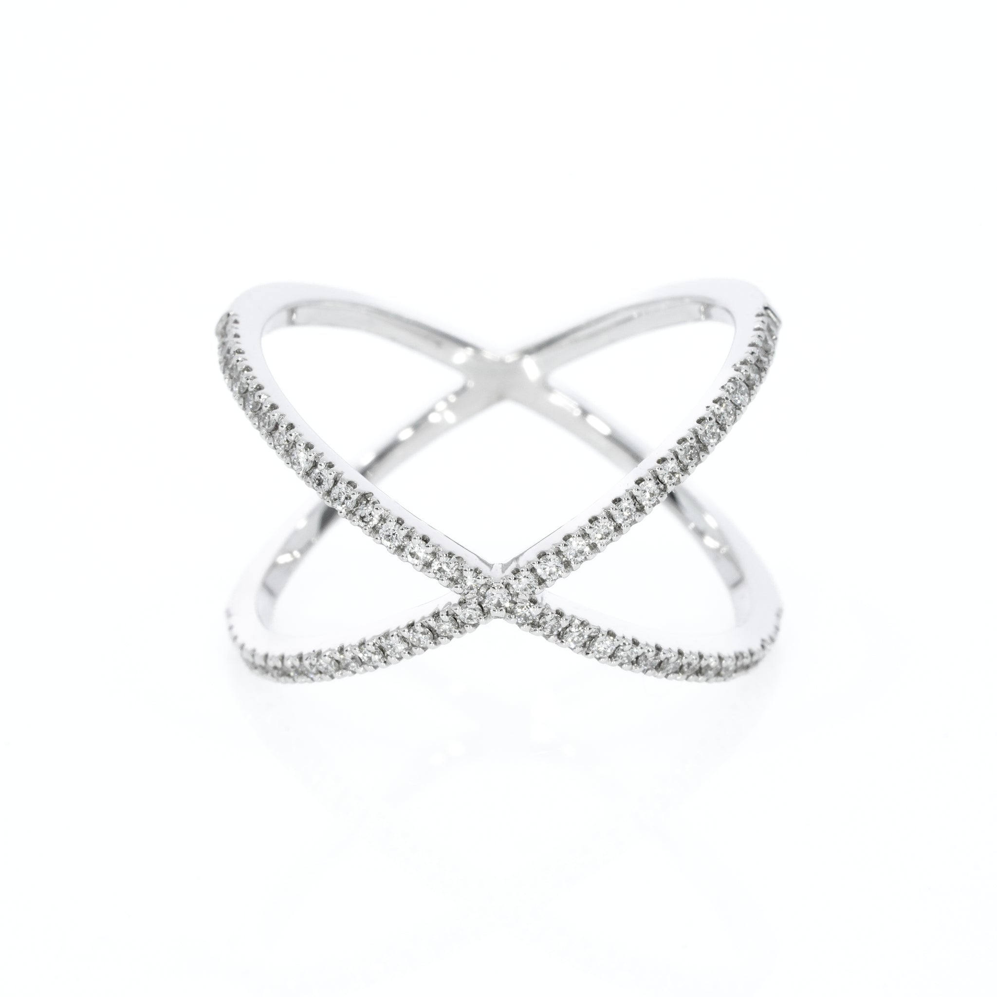 Medium criss-cross ring with 0.23cts round brilliant cut diamonds, white gold colour set in 18ct gold. 