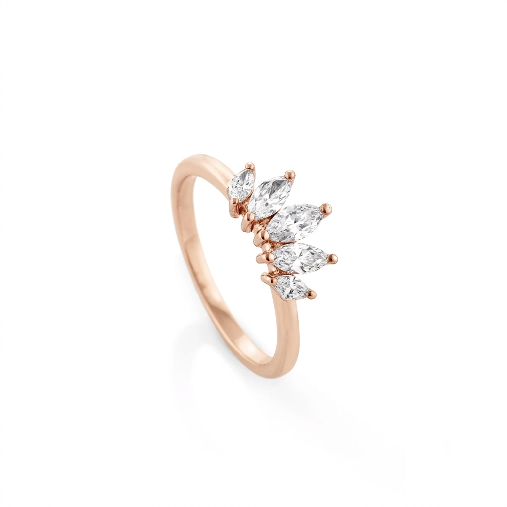 Rose gold Crown Ring featuring marquise cut diamonds on a gold band, an elegant diamond ring for weddings.