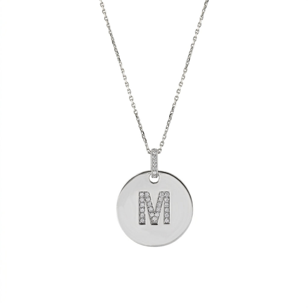 Love Letter Disk necklace with initial M in certified diamonds set in white gold chain.
