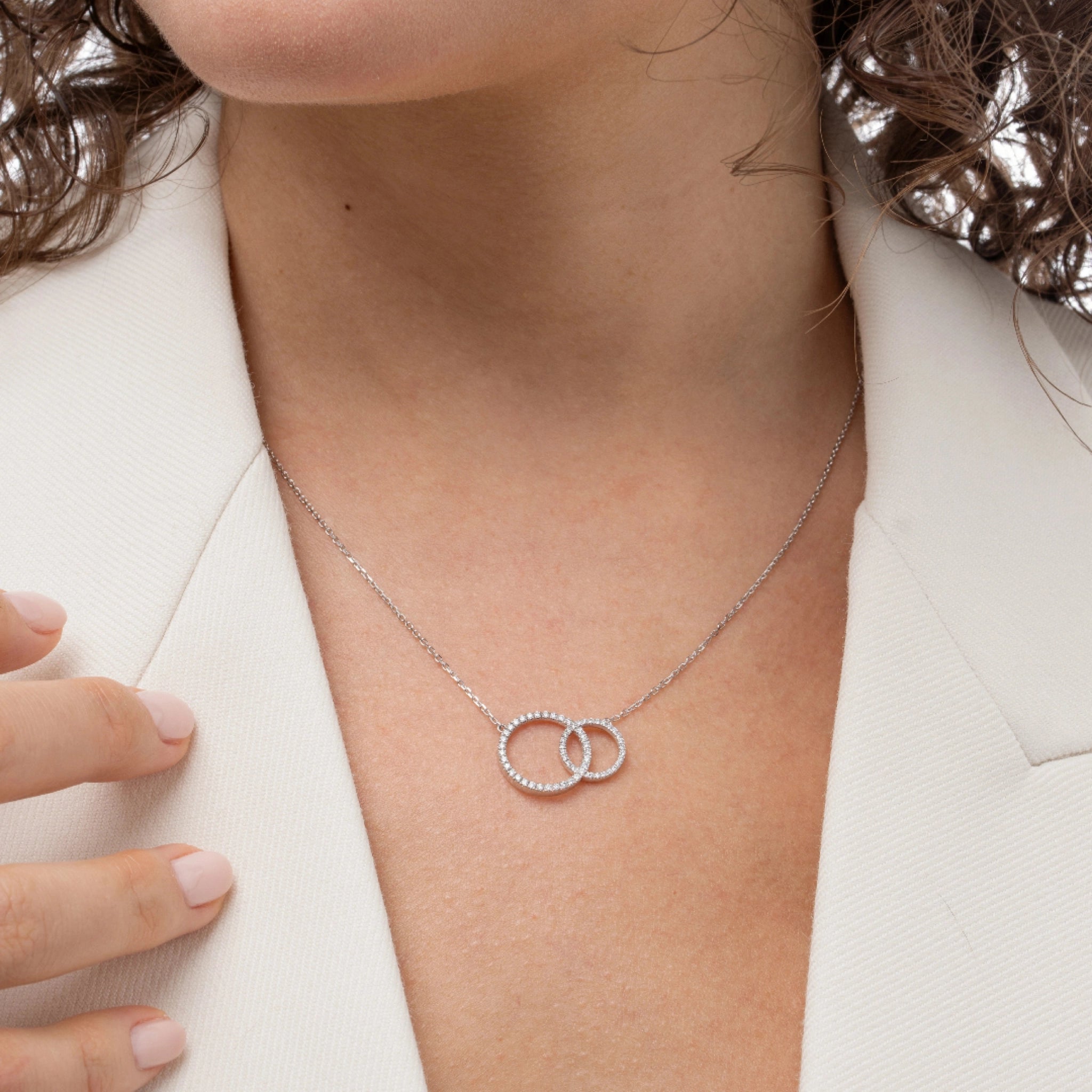 Duo Circle diamond necklace certified diamonds, elegantly worn on a model's neck.