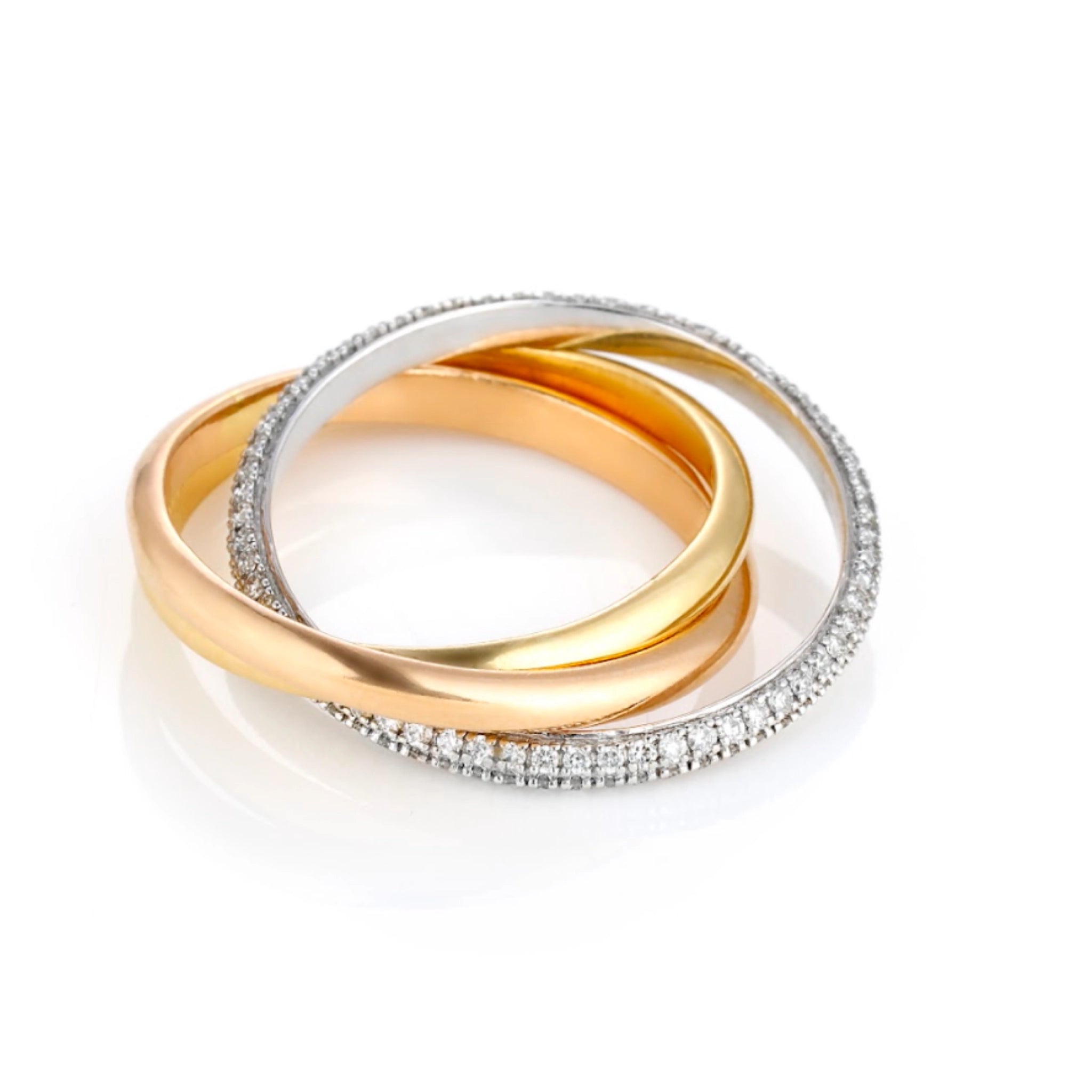 Grace ring with three intertwined bands in yellow, rose, and white gold, one set with diamonds 