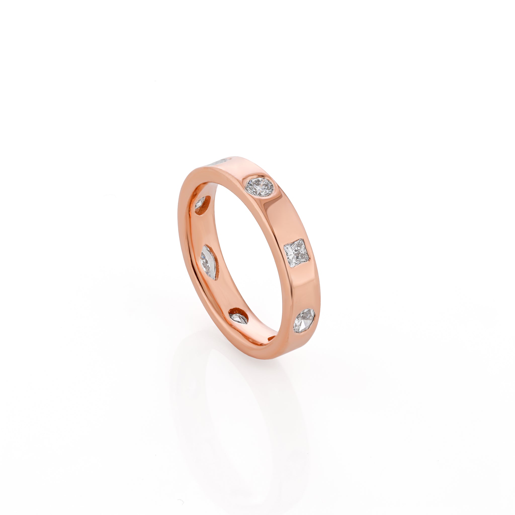 Rose gold ring with embedded diamonds on a white background