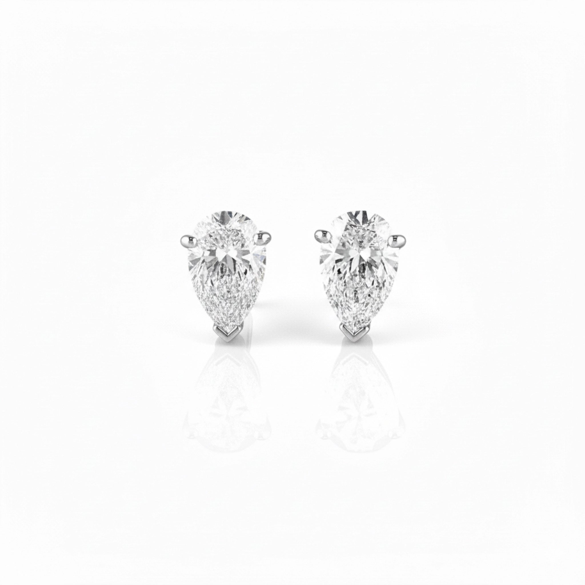Pear Diamond Stud Earrings featuring exquisite pear shape diamonds, hand crafted and GIA certificated for natural brilliance.