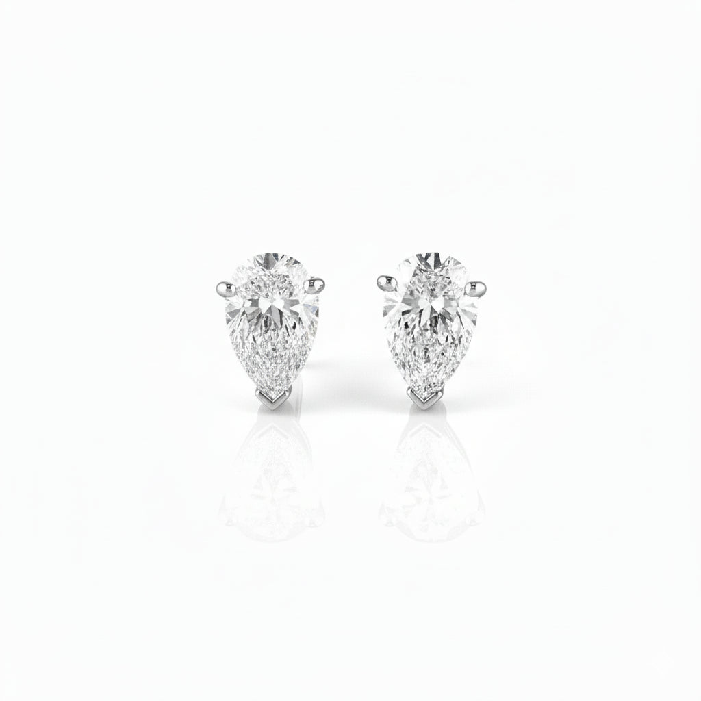Pear Diamond Stud Earrings featuring exquisite pear shape diamonds, hand crafted and GIA certificated for natural brilliance.