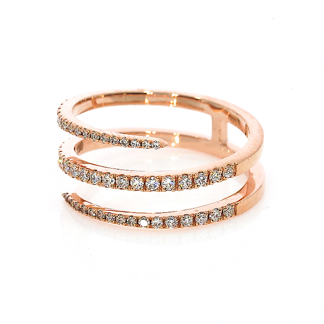 Rose gold ring with embedded diamonds on a white background