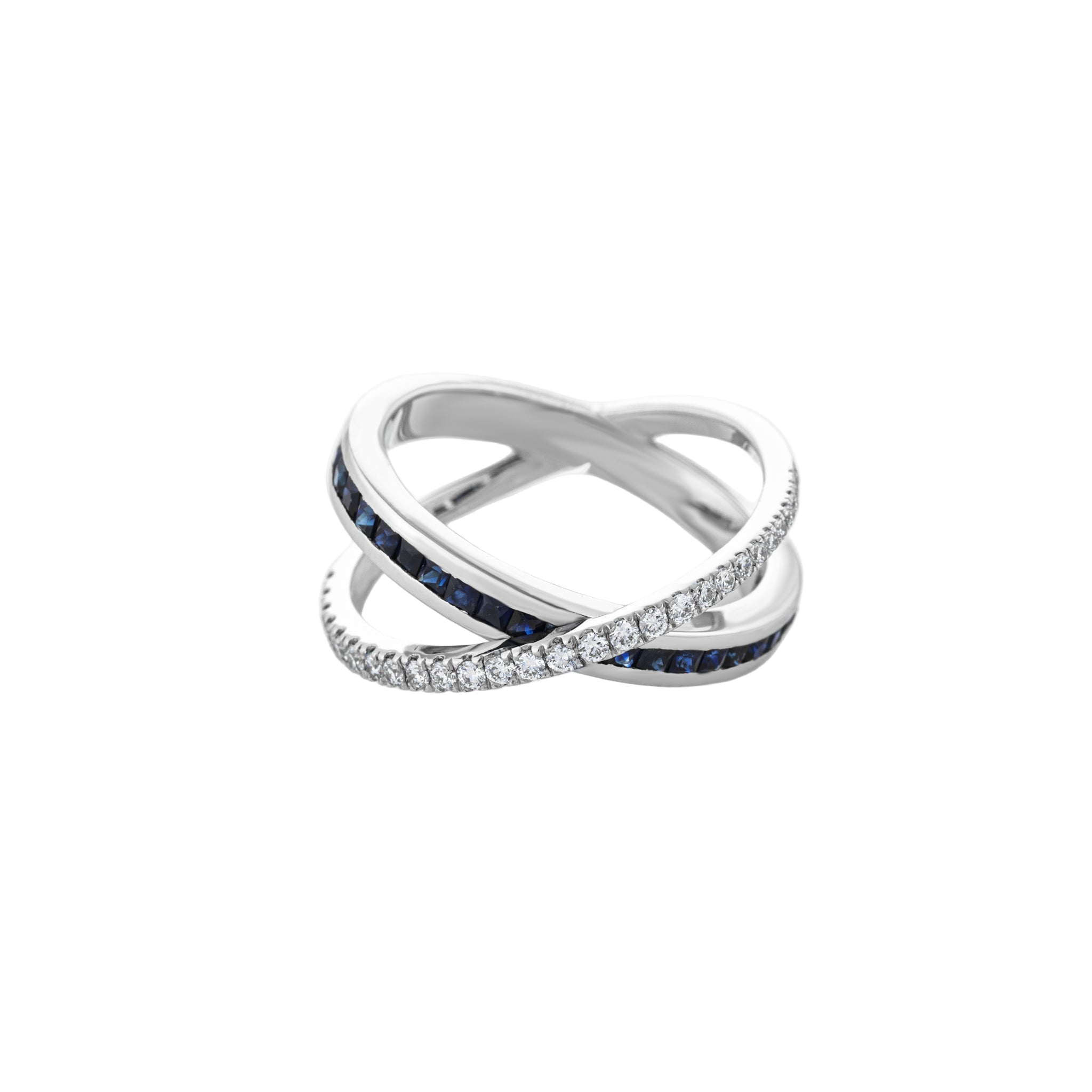 Stunning sapphire criss cross ring showcasing blue sapphires and diamonds set in white gold, a perfect gemstone ring.