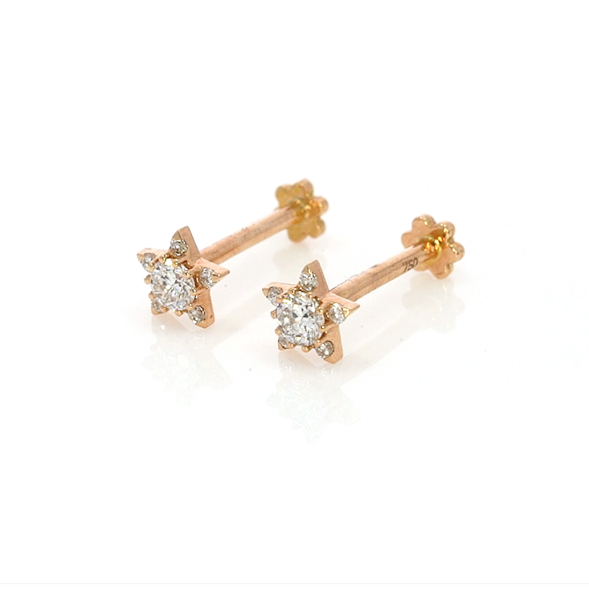 Small star earrings with certified diamond earrings featuring brilliant cut diamonds set in 18ct gold.