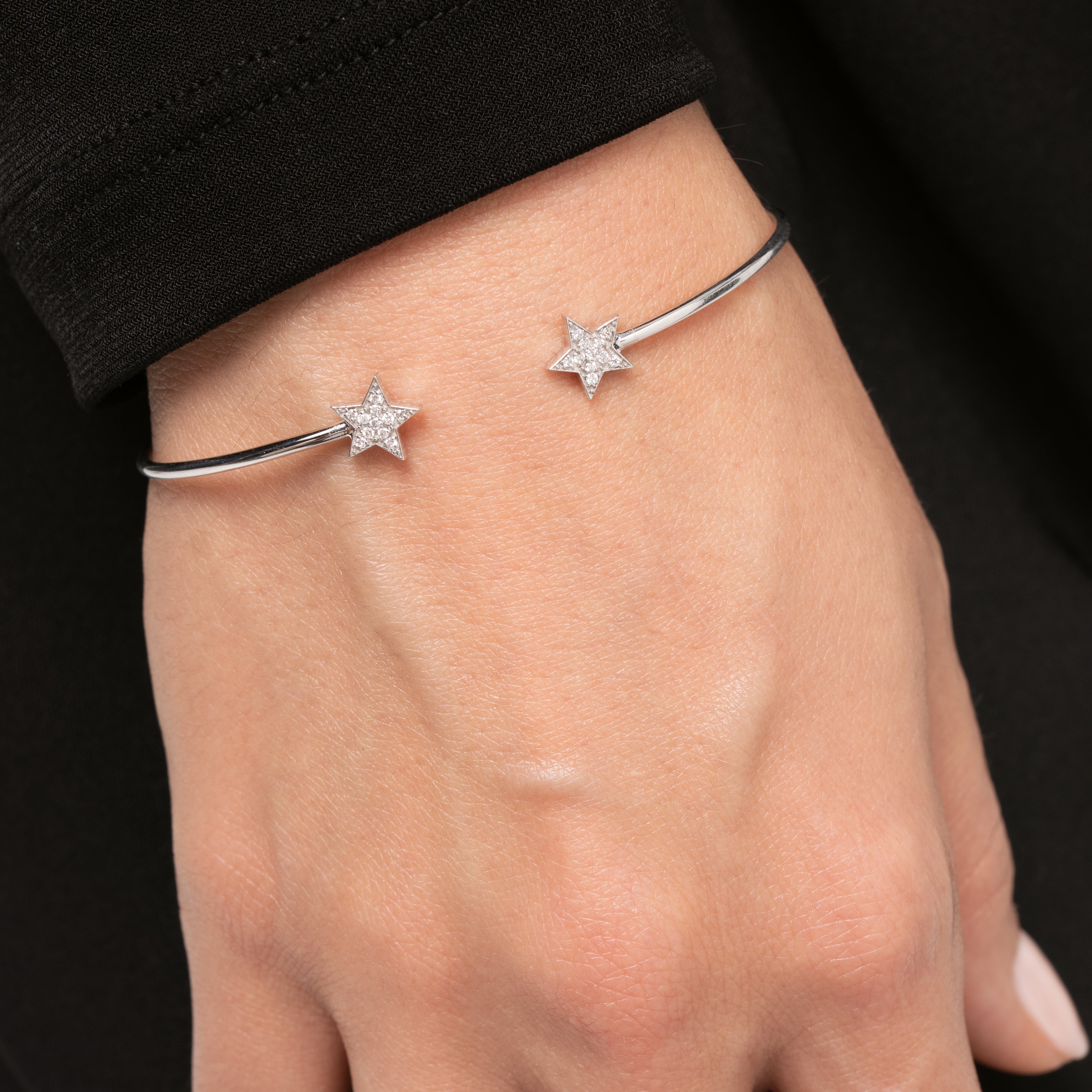 Star bangle featuring certified diamond stars, perfect for stacking or everyday wear.