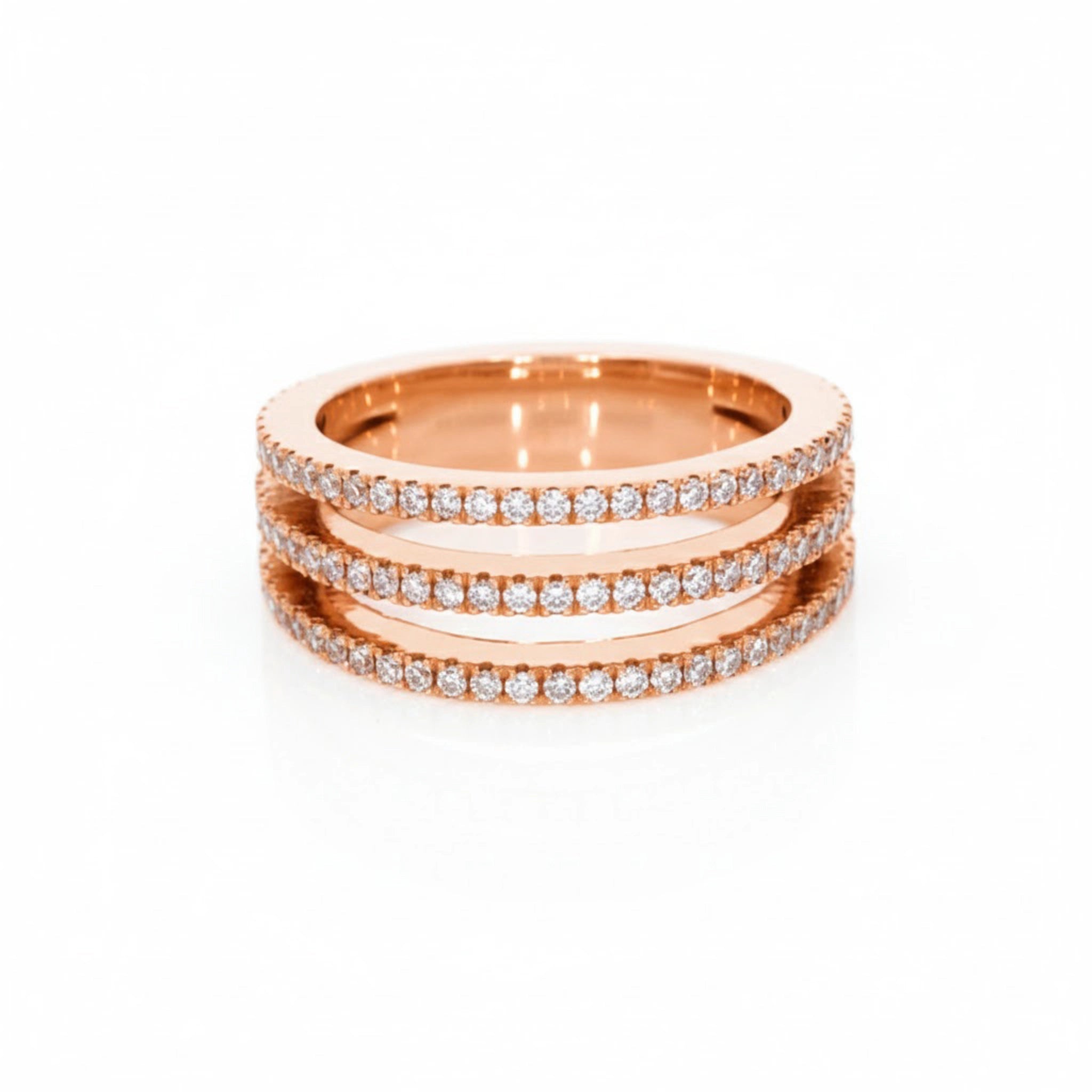 Three row diamond ring featuring three strands of sparkling diamonds set in rose gold.