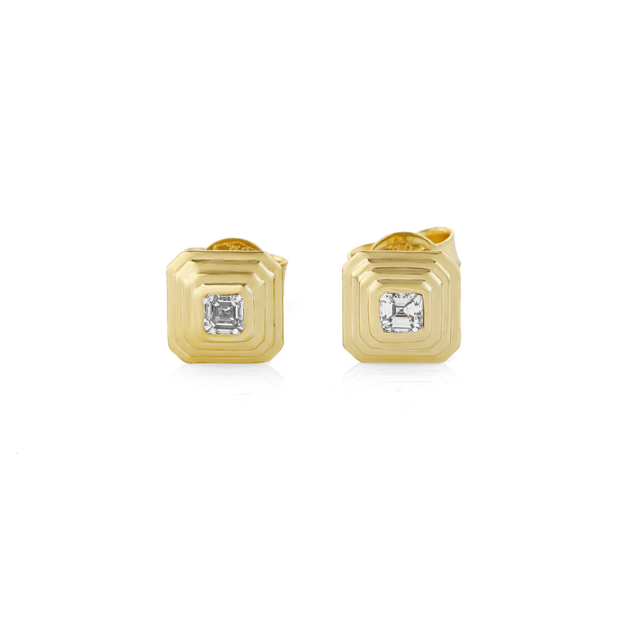 Gold square earrings with embedded diamonds on a white background
