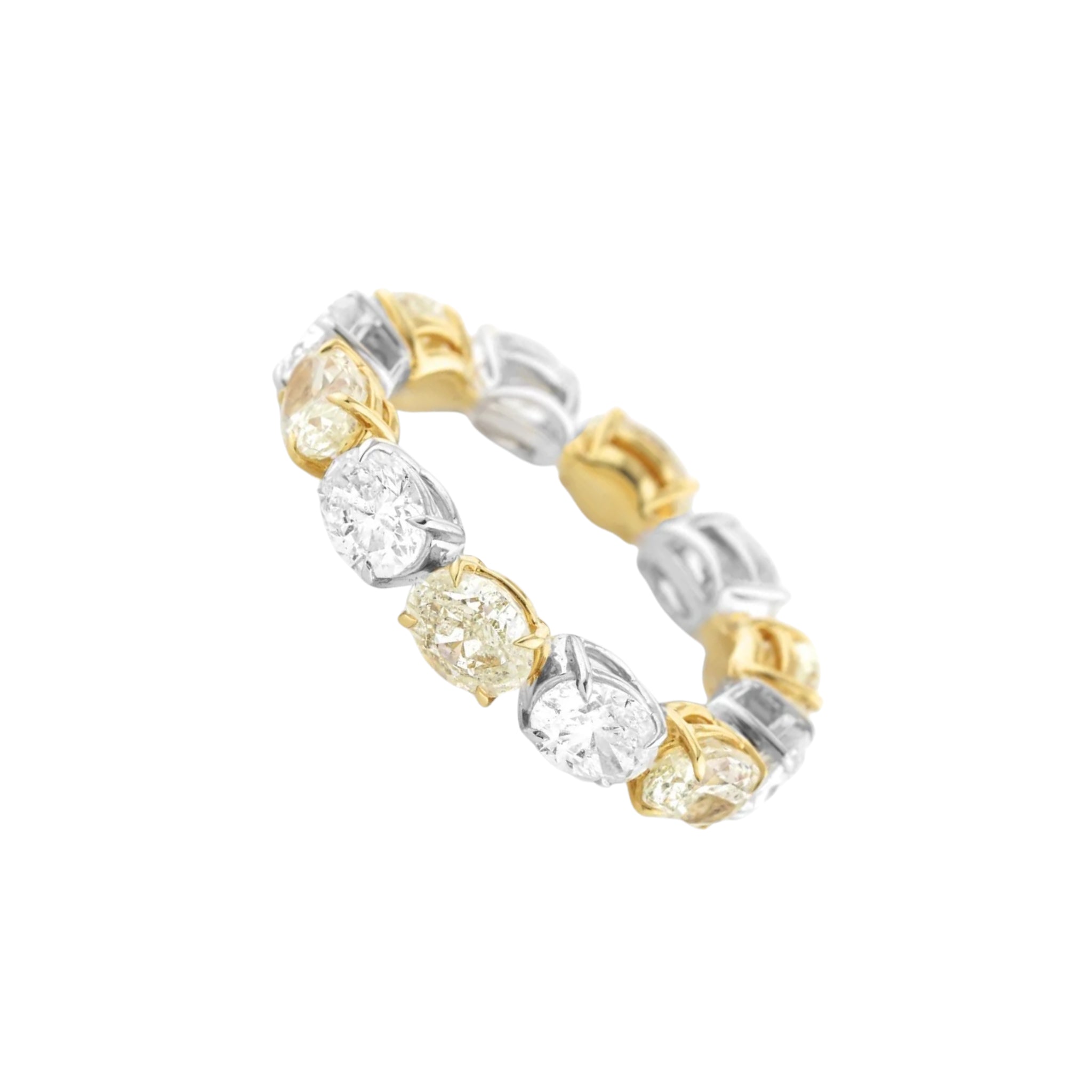 Yellow & White Oval Diamond Eternity Ring featuring a bold alternating pattern of yellow and white diamonds.