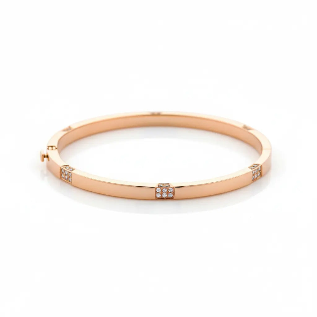 Luxury solid rose gold bangle featuring clusters of diamonds for an elegant modern accessory.