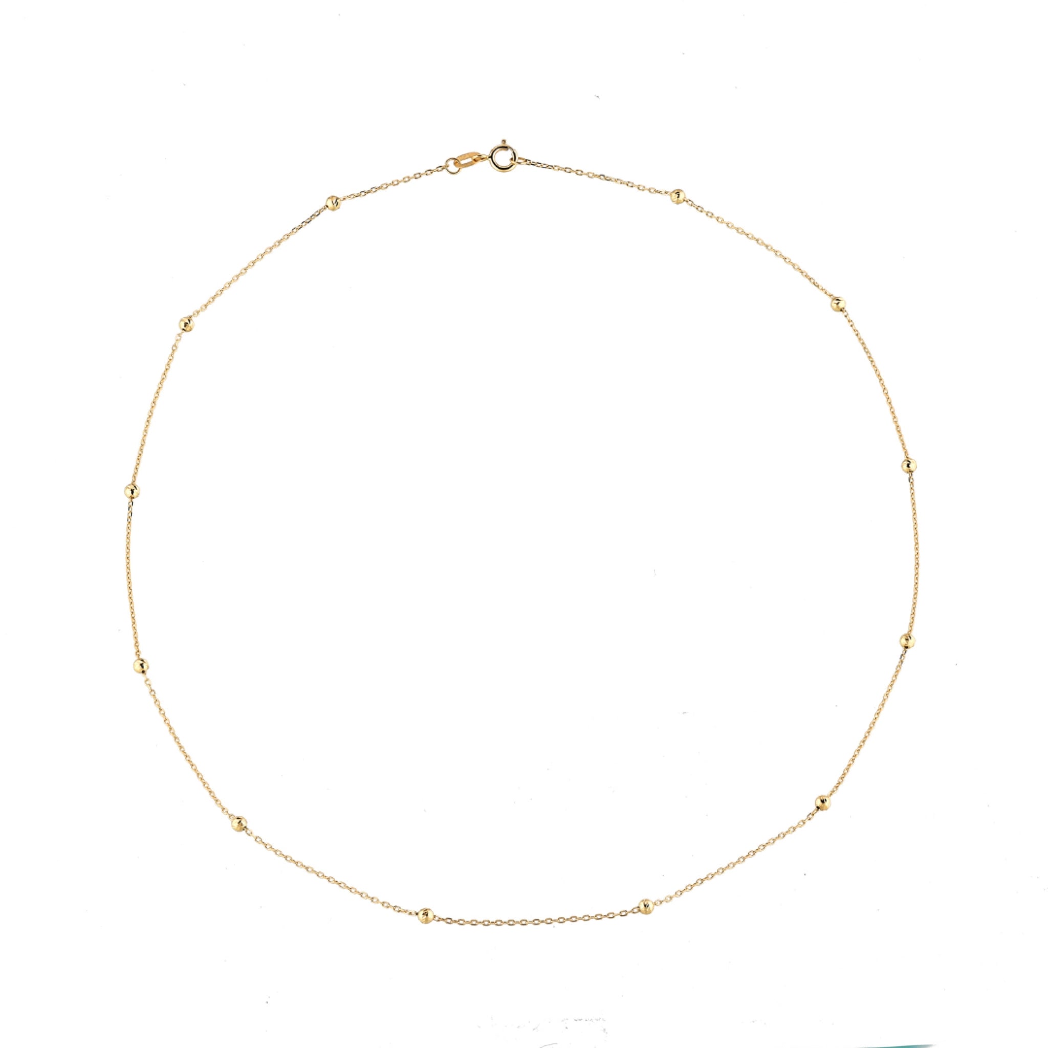 18ct gold ball necklace featuring delicate gold balls, perfect for layering or wearing alone. Ideal diamond necklace.