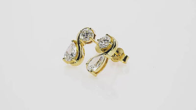 Yellow gold Elisabeth earrings featuring pear shaped diamonds