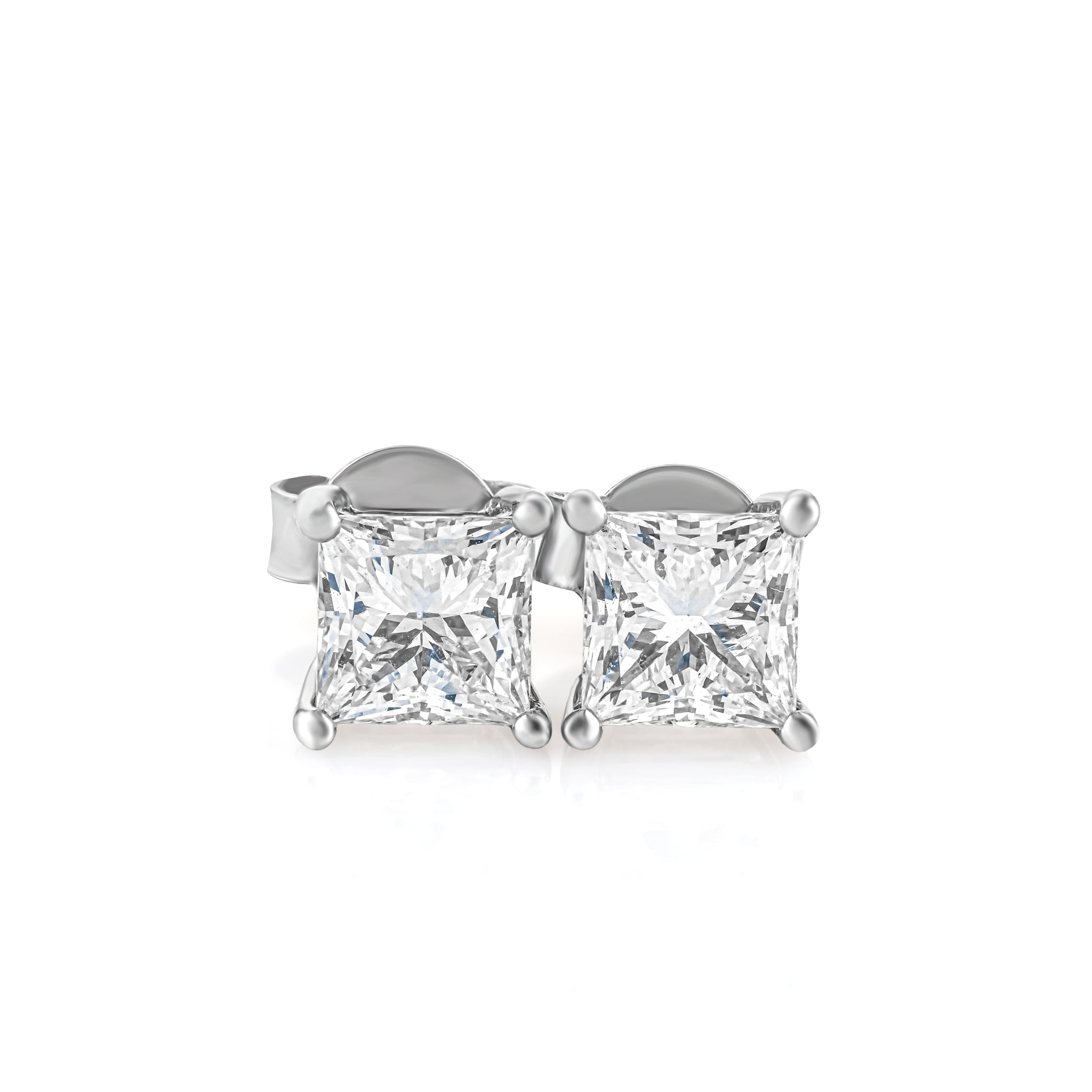 Pair of princess cut diamond stud earrings on a white background