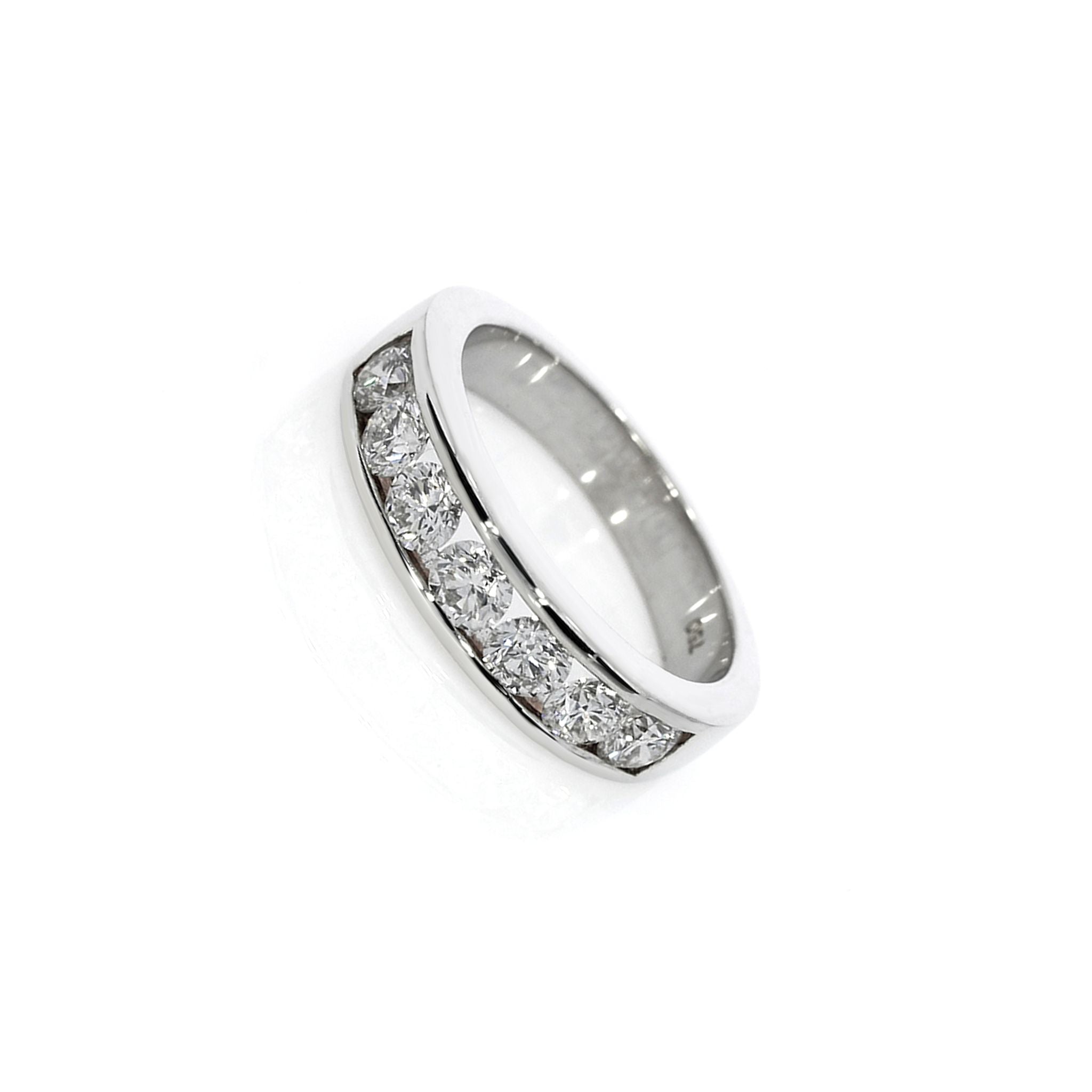 Seven stone channel set diamond ring