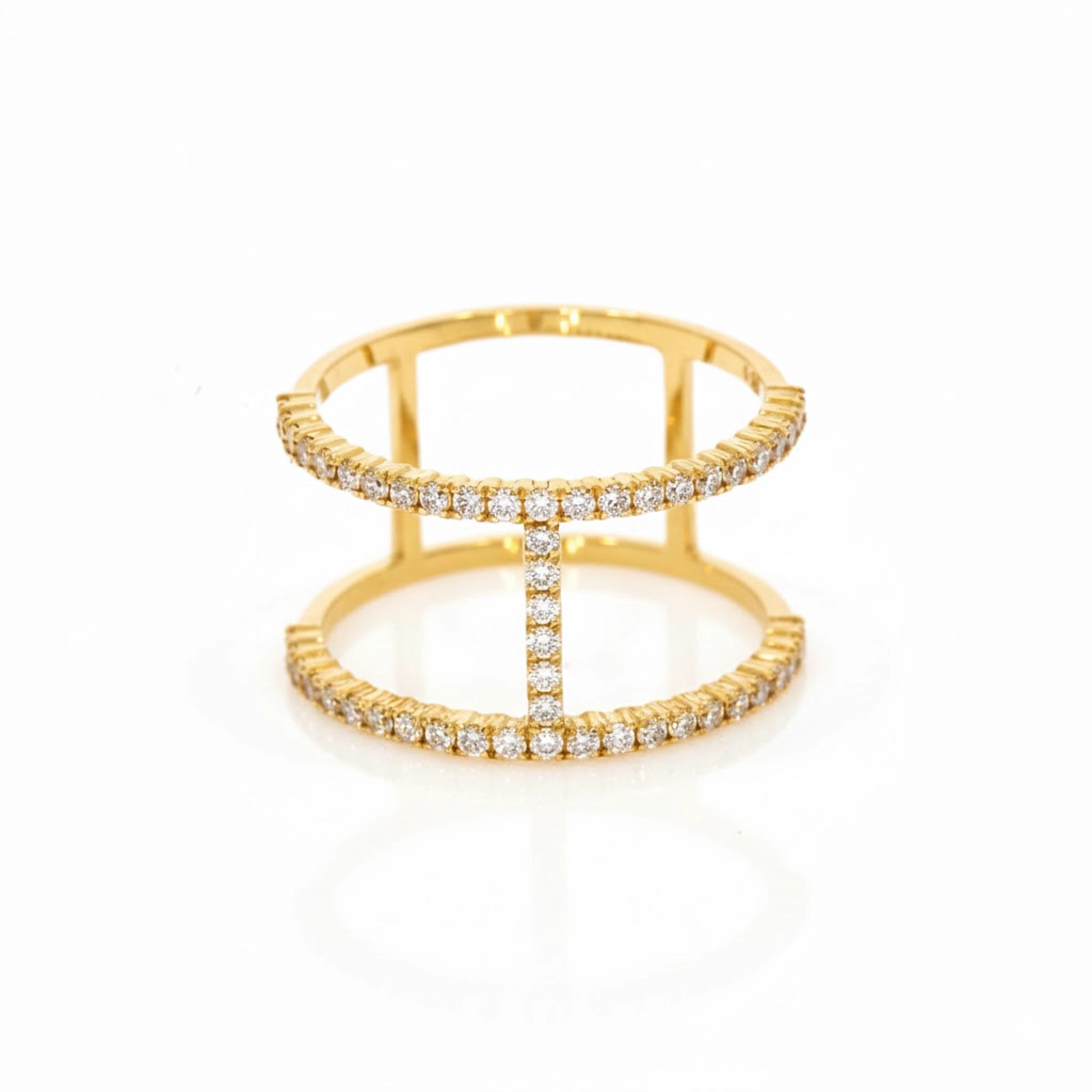 18ct Yellow Gold H shaped ring with diamonds on a white background