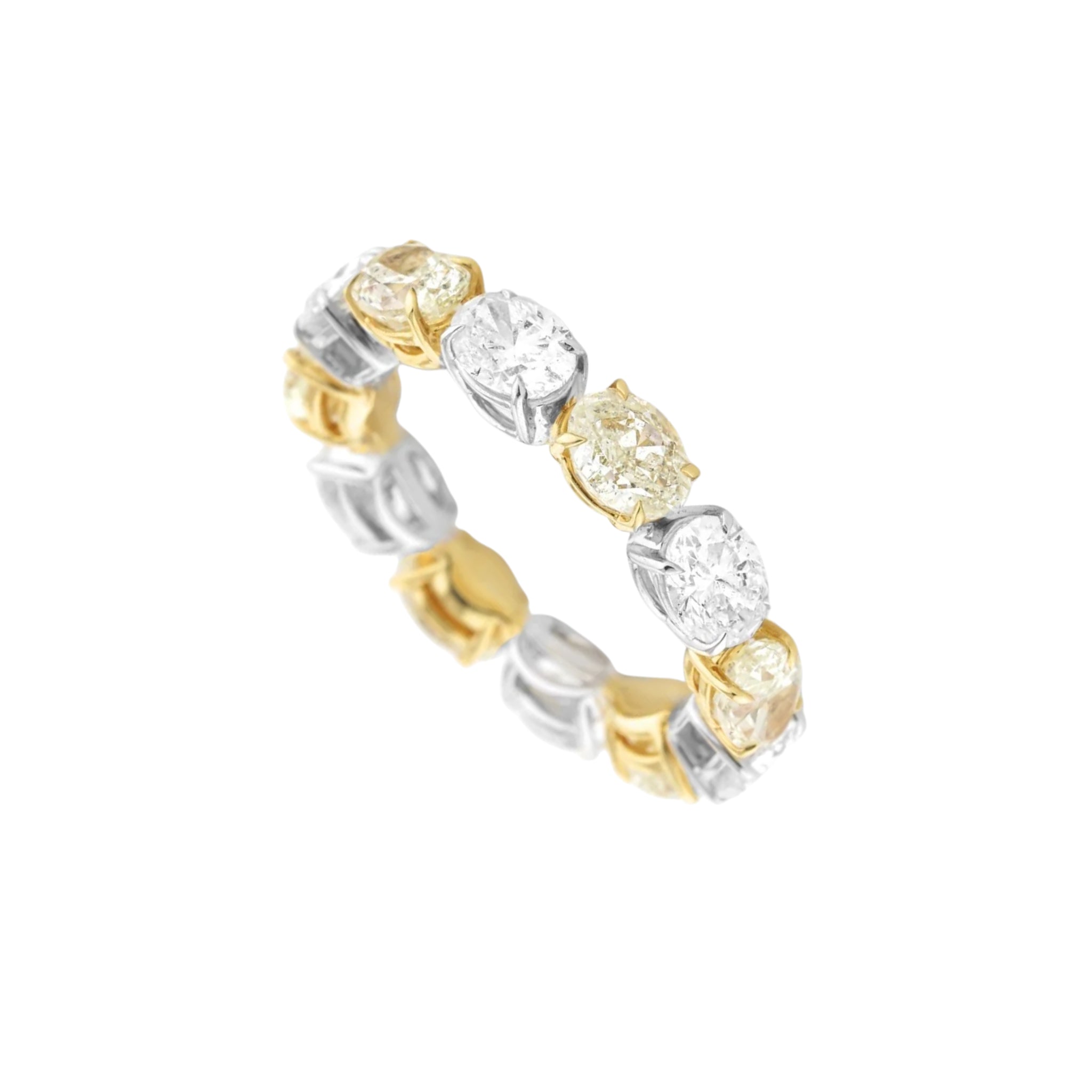 Yellow & White Oval Diamond Eternity Ring featuring a bold alternating pattern of yellow and white diamonds.
